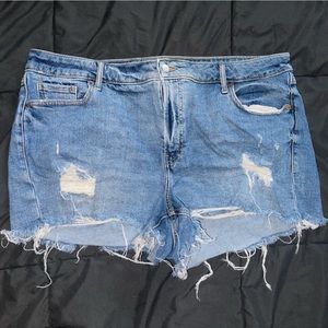 Of navy jean shorts